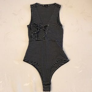 Striped bodysuit with criss cross neckline